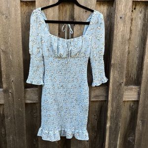 Midi dress with a open back. Floral.